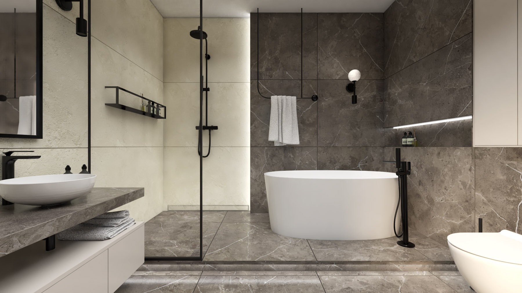 Nowoczesna łazienka z marmurową posadzką i ścianami, okrągła wanna wolnostojąca, przeszklona kabina prysznicowa, umywalka nablatowa na kamiennym blacie, czarne elementy armatury.