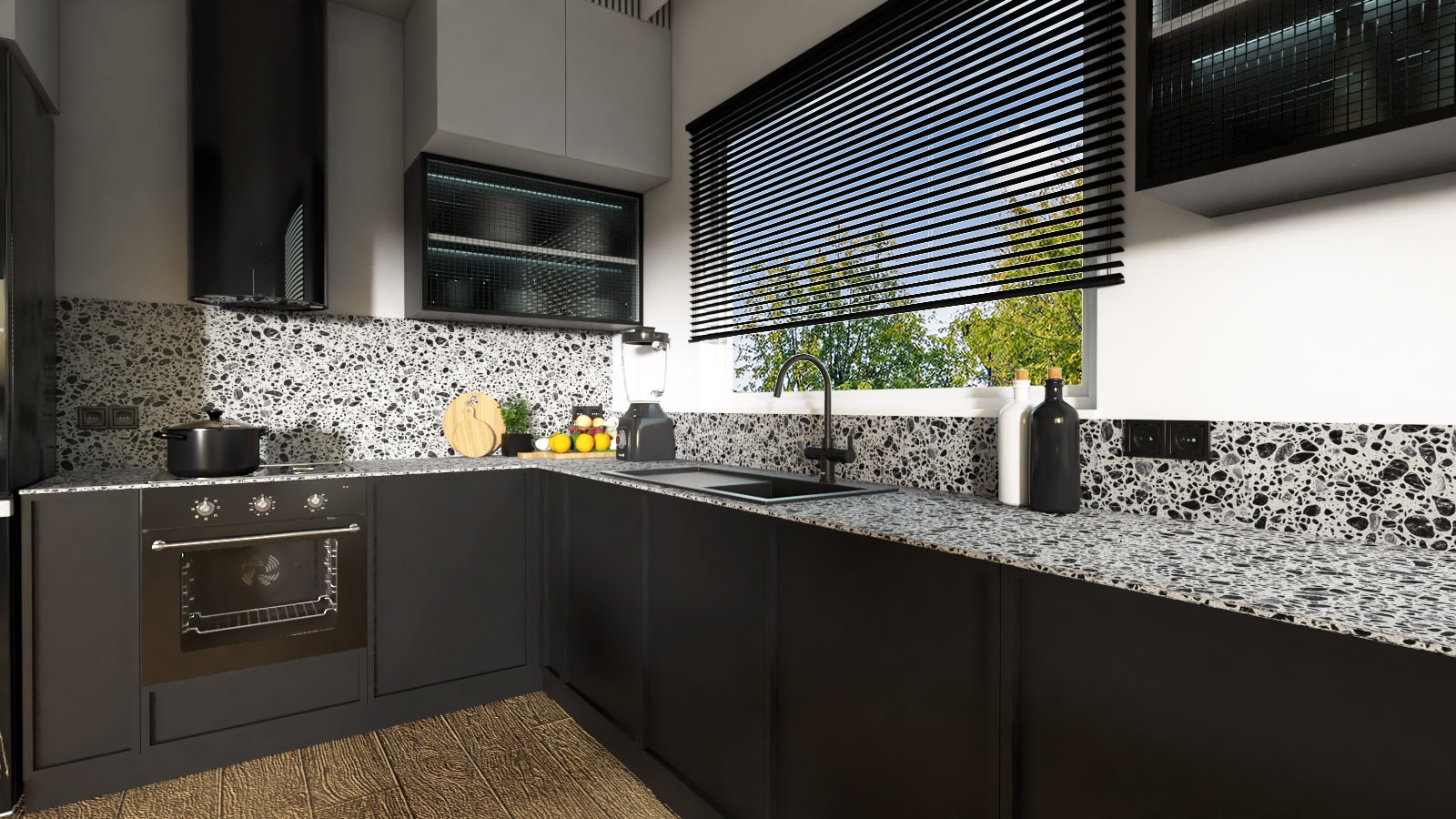 Nowoczesna kuchnia w odcieniach szarości i czerni, z blatem i backsplashiem w terrazzo, czarnymi frontami szafek, drewnianą podłogą i oknem z żaluzjami poziomymi.