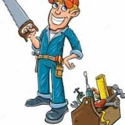 Uśmiechnięty rysunkowy majsterkowicz w kombinezonie i czapce, trzymający piłę, obok skrzynka z narzędziami.