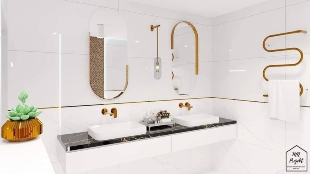 Wizualizacja łazienki z białymi płytkami, czarnym blatem, owalnymi lustrami z złotymi ramami, złotą grzałką ręcznikową i doniczką ze sztucznym sukulentem.