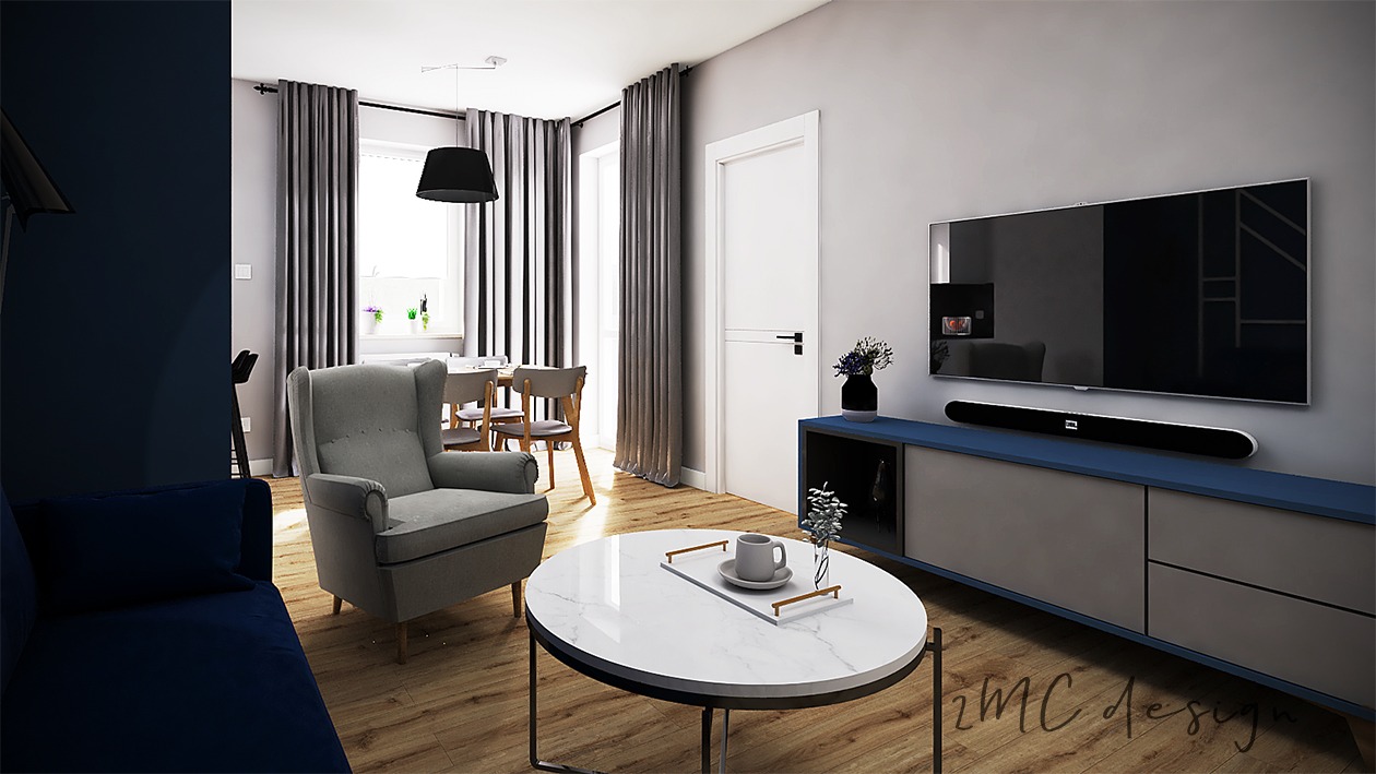 Wizualizacja salonu z szarą tapicerowaną sofą, fotelem typu uszak, okrągłym stolikiem kawowym z marmurowym blatem, szafką RTV w odcieniach szarości i niebieskiego oraz dużym telewizorem na ścianie.