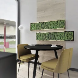 Nowoczesna przestrzeń biurowa z czarnym okrągłym stołem, dwoma musztardowymi krzesłami i panelami z mchu na ścianie z drewnianą okładziną, widok na zewnątrz przez duże okno.