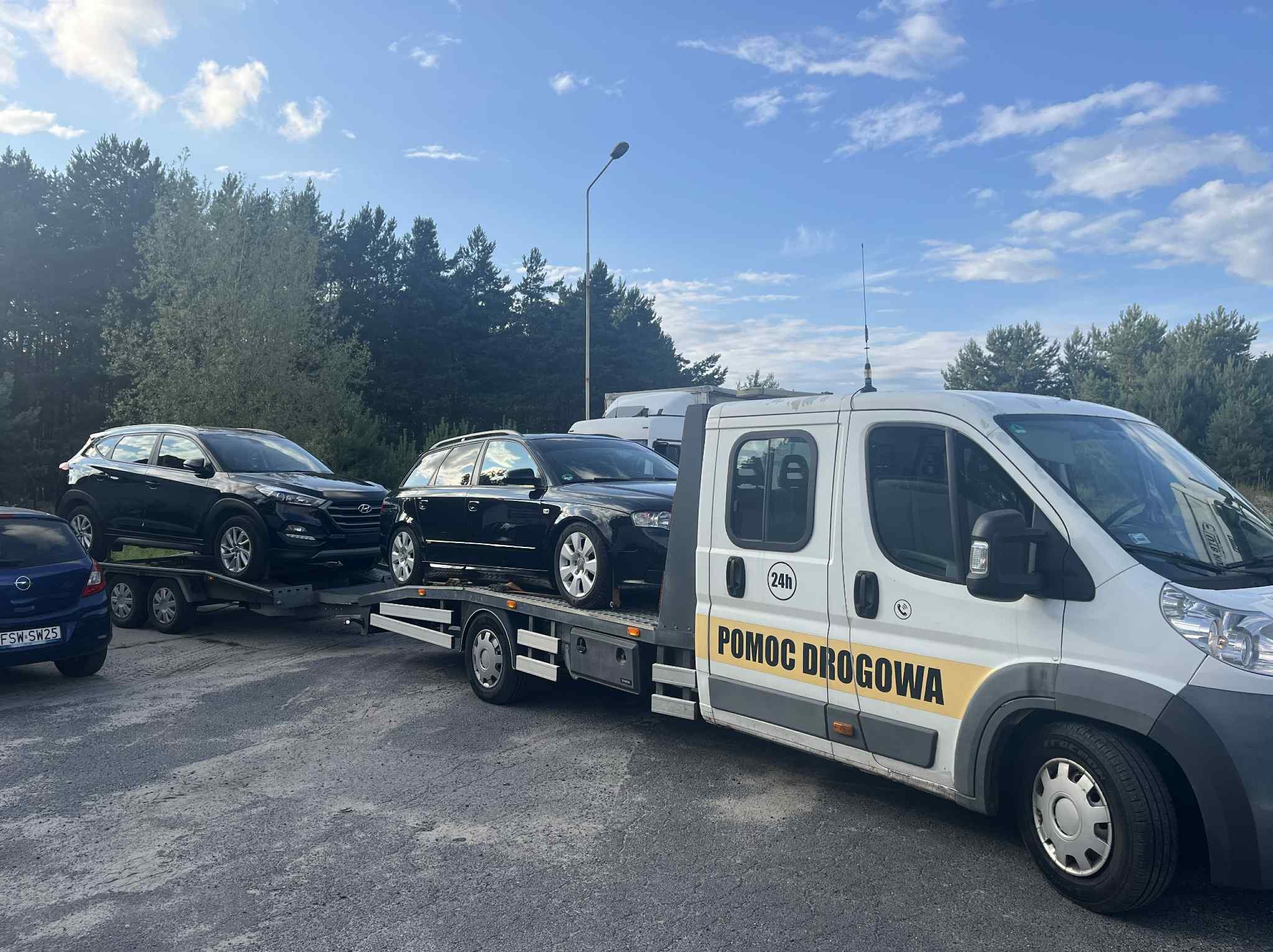 Holowanie Giżycko Kętrzyn Pisz Ełk bus 9 8 7 osobowy busy dostawcze wynajem samochodów busów laweta pomoc drogowa