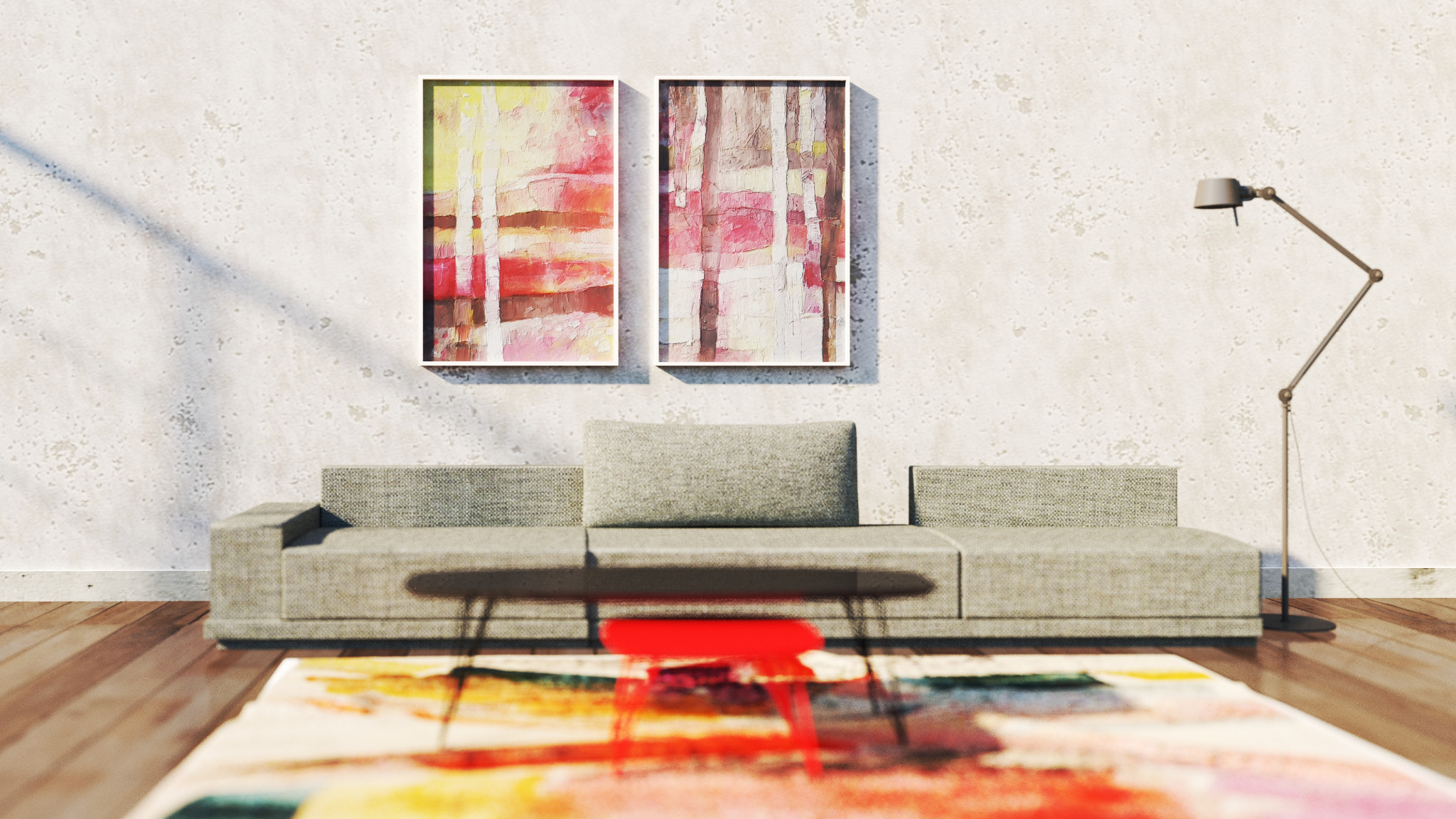 Minimalistyczny salon z szarą sofą modułową, abstrakcyjnymi obrazami w białych ramach, czerwoną ławą i designerską lampą podłogową.