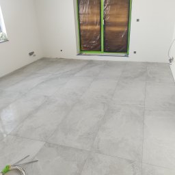Wykonawstwo robót budowlanych - Pierwszorzędny Montaż Sufitu Podwieszanego Ciechanów