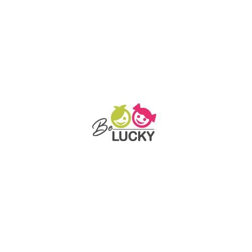 Logo firmy z dwoma uśmiechniętymi postaciami, jedna zielona, druga różowa, obok napisu 'Be LUCKY'.