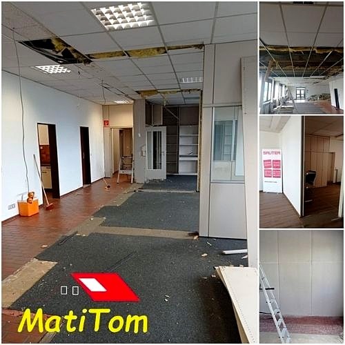 Wnętrze biura w trakcie demontażu sufitu podwieszanego i ścian działowych, widoczne odsłonięte instalacje i fragmenty zniszczonego sufitu, na podłodze leżą resztki materiałów budowlanych, w rogu...