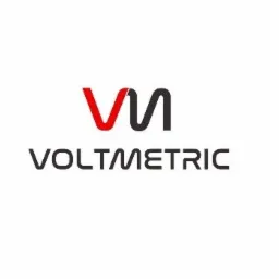 Logo firmy Voltmetric z czerwono-czarnym symbolem graficznym i nazwą w kolorze szarym na białym tle.