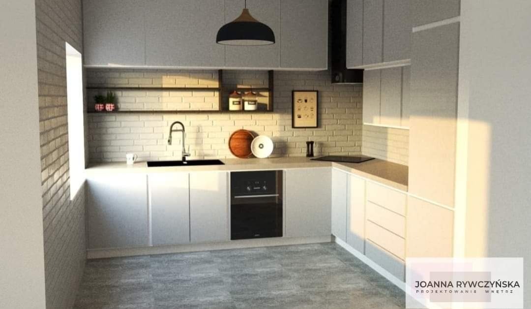 Wizualizacja nowoczesnej kuchni z białymi szafkami, ceglaną ścianą, czarnym zlewem i lampą wiszącą. Na blacie kuchennym dekoracje, deska do krojenia i przyprawy.