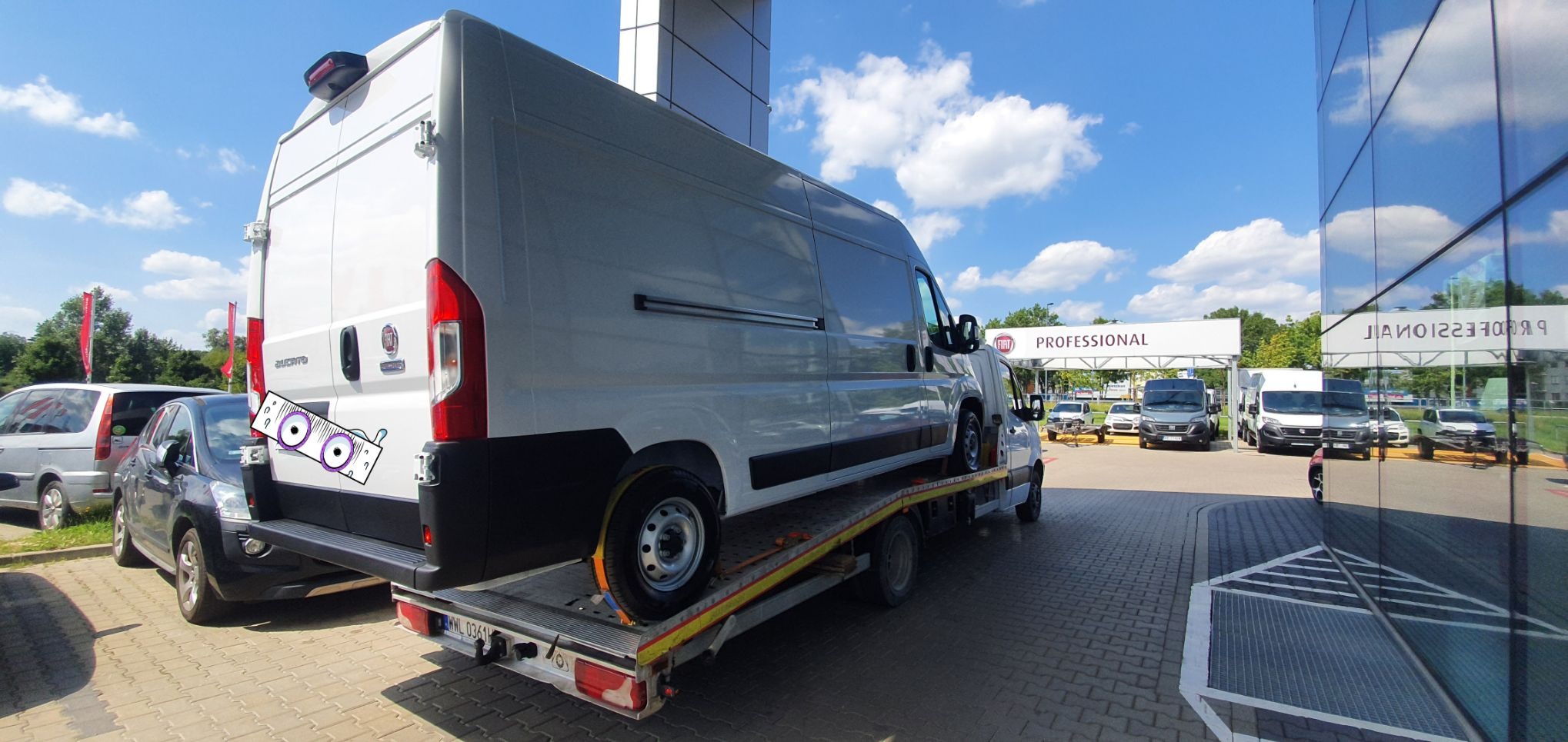 Holowanie nowej maszyny od dilera do klienta