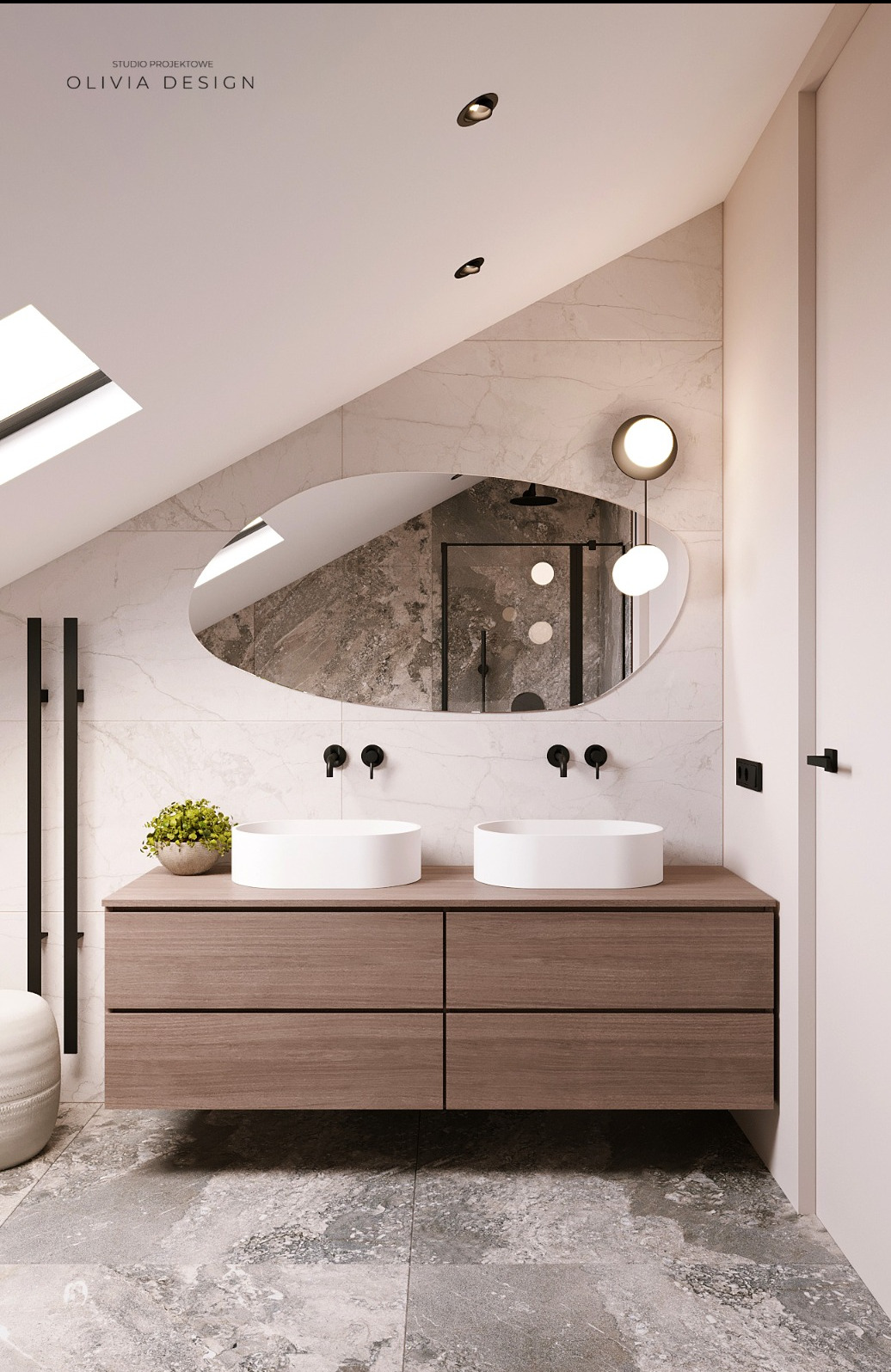 Nowoczesna łazienka na poddaszu z podwójną umywalką nablatową, owalnym lustrem odbijającym kabinę prysznicową i marmurową okładziną ścian.