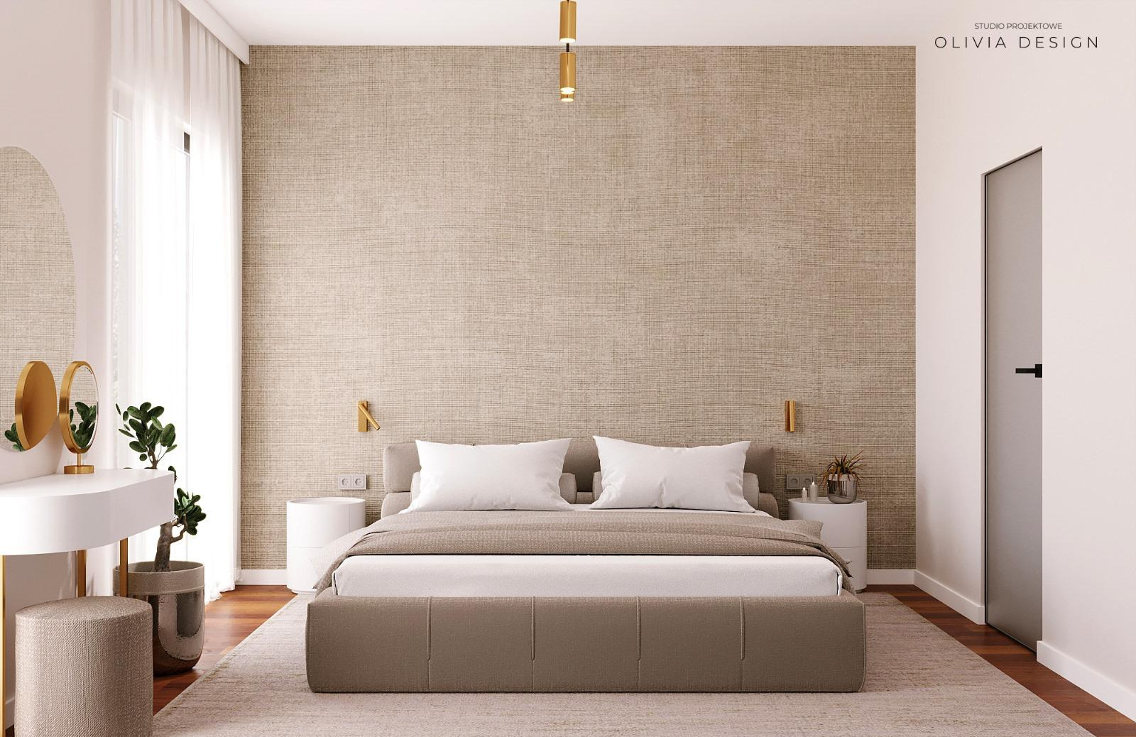 Neutralna sypialnia z teksturowaną tapetą, łóżkiem z tapicerowanym wezgłowiem, toaletką z okrągłym lustrem i złotymi akcentami oświetleniowymi.