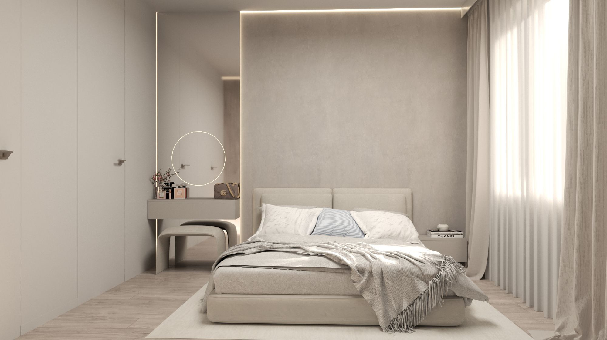 Jasna sypialnia z toaletką i okrągłym lustrem podświetlonym LED, neutralna kolorystyka, drewniana podłoga, zasłony wpadające w światło, książka Chanel na stoliku nocnym.