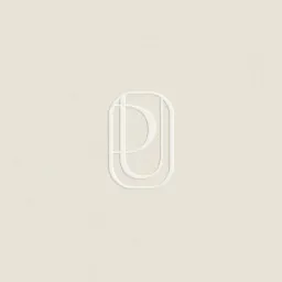 Minimalistyczne logo z literą 'D' i 'U' wewnątrz owalnej ramki, tłoczone na kremowym papierze o delikatnej fakturze.