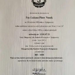 Dokument potwierdzający wpis na listę radców prawnych Okręgowej Izby Radców Prawnych w Bydgoszczy dla Pana Łukasza Piotra Noska, z pieczęcią i podpisem Dziekana Rady.