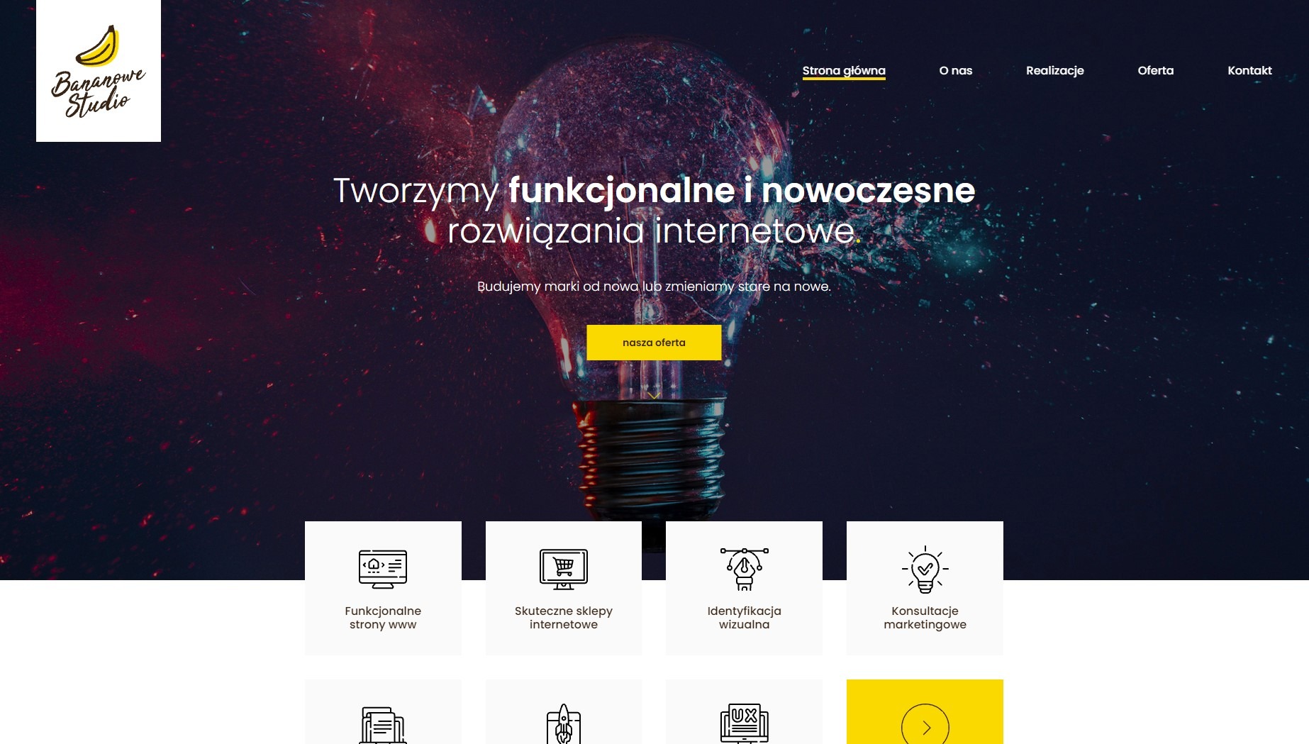 Strona główna agencji interaktywnej z motywem żarówki symbolizującej innowacyjne rozwiązania internetowe, tekst: Tworzymy funkcjonalne i nowoczesne rozwiązania internetowe.