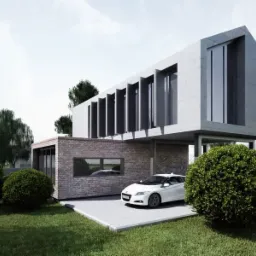 Nowoczesny dom z betonu i cegły z białym samochodem na podjeździe, otoczony zielenią.
