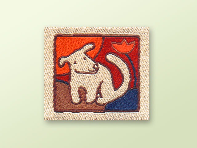 Wszywka do odzieży dziecięcej, w pieskiem