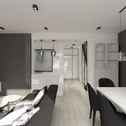 Wizualizacja nowoczesnego wnętrza z otwartą przestrzenią: salon z szarą sofą i marmurowym stolikiem kawowym, biała kuchnia z wyspą, jadalnia z czarnymi krzesłami i białym stołem, szklane lampy...