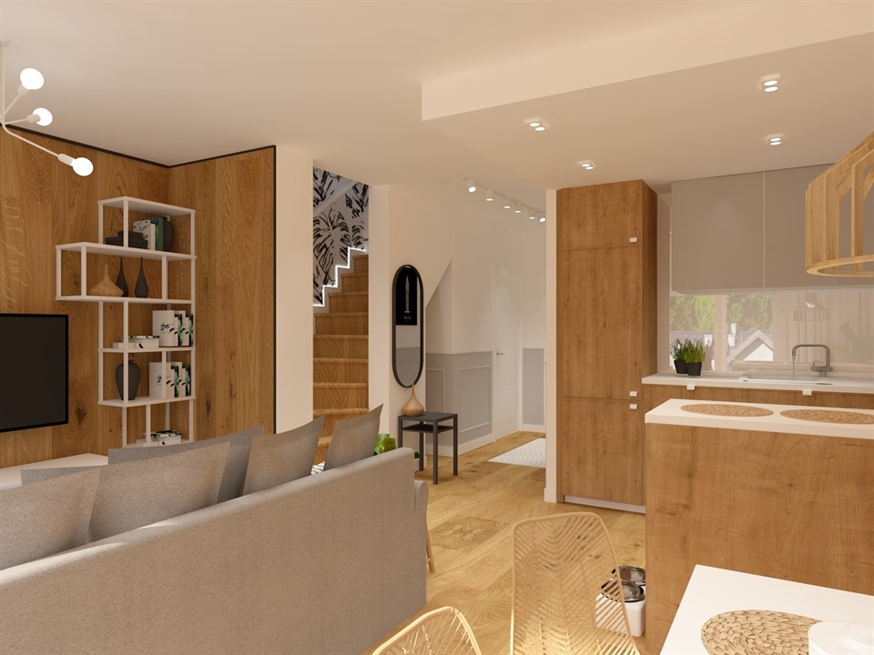 Wizualizacja przestronnego wnętrza: salon z drewnianą ścianą i regałem, przechodzący w kuchnię z drewnianymi szafkami, schody z motywem roślinnym w tle.