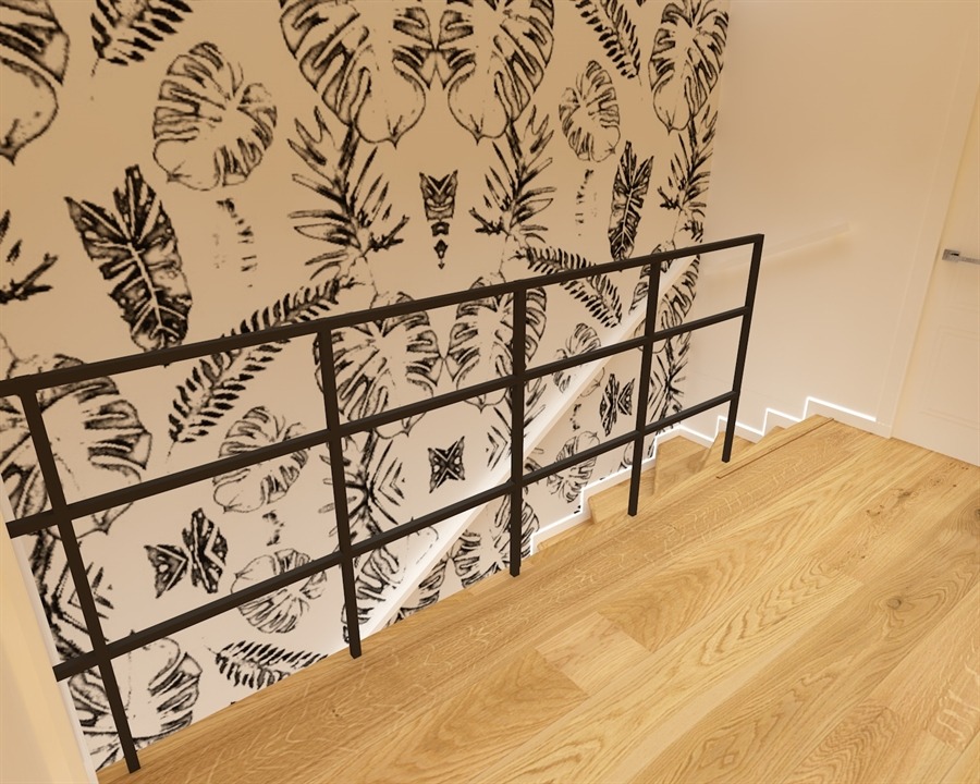 Schody z drewnianymi stopniami, czarną metalową balustradą i tapetą w motywy roślinne w czerni i bieli.