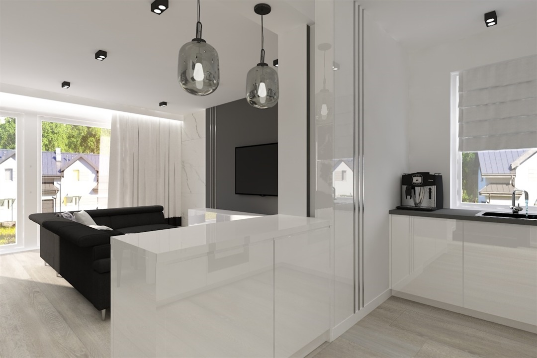Wnętrze nowoczesnego apartamentu z otwartą kuchnią, salonem i minimalistycznym wystrojem, wiszące szklane lampy nad wyspą kuchenną, czarna skórzana sofa w części wypoczynkowej.