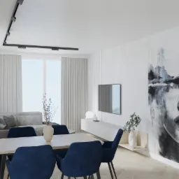 Wnętrze salonu z jadalnią, minimalistyczny design, stół z ciemnoniebieskimi krzesłami, abstrakcyjny obraz na ścianie, oświetlenie szynowe.