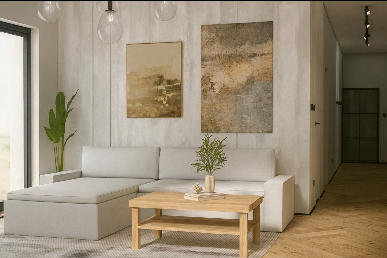 Jasny salon z narożną sofą, drewnianym stolikiem kawowym i abstrakcyjnymi obrazami na ścianie. Minimalistyczny design z roślinami doniczkowymi i parkietem w jodełkę.