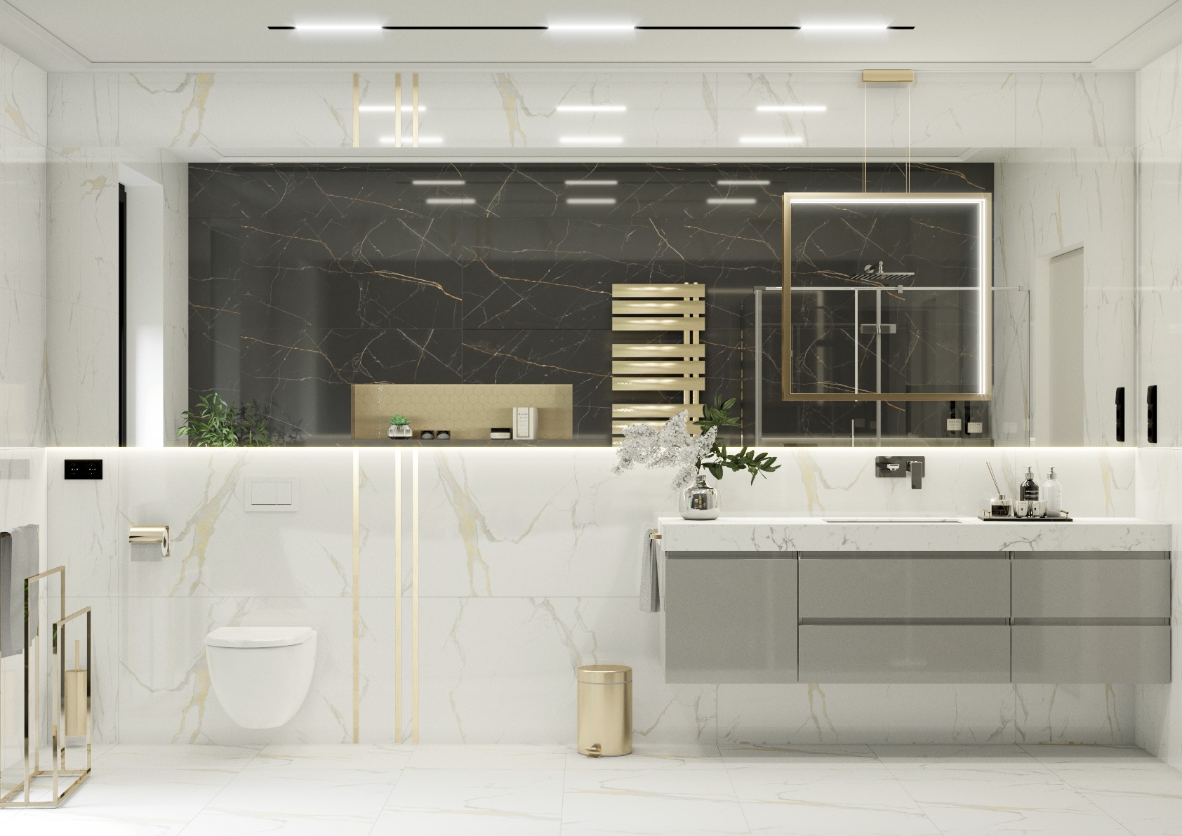 Elegancka łazienka z marmurowymi płytkami, podwieszaną toaletą, szarą szafką pod umywalką i złotymi akcentami, w tym grzejnikiem drabinkowym i koszem na śmieci.