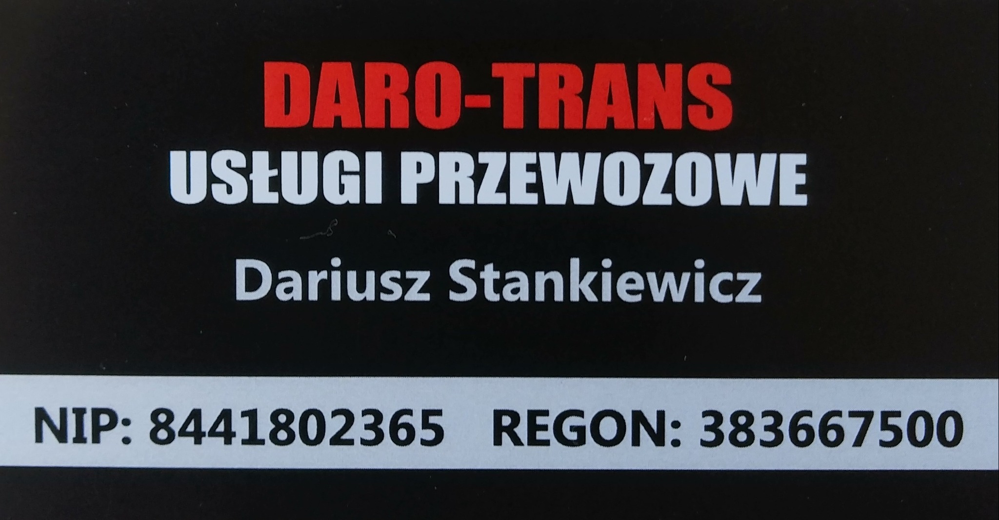 Wizytówka firmy Daro-Trans oferującej usługi przewozowe, z danymi kontaktowymi i numerami NIP oraz REGON.