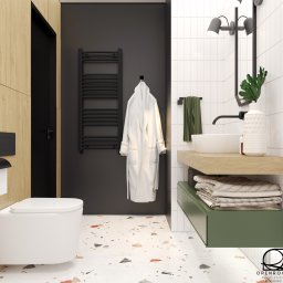 Projekt łazienki z elementami drewna, zieleni i czerni. 