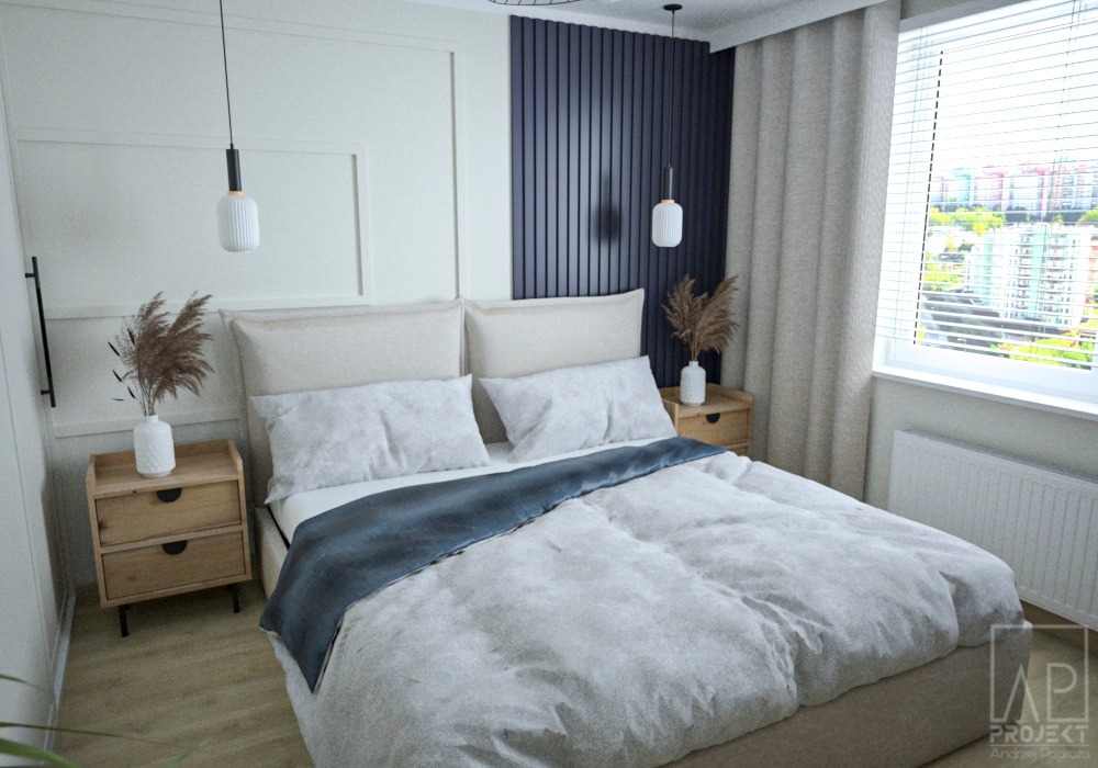 Jasna sypialnia z beżowym łóżkiem, niebieskim pledem, drewnianymi szafkami nocnymi i białymi lampami wiszącymi, widok na miasto za oknem.