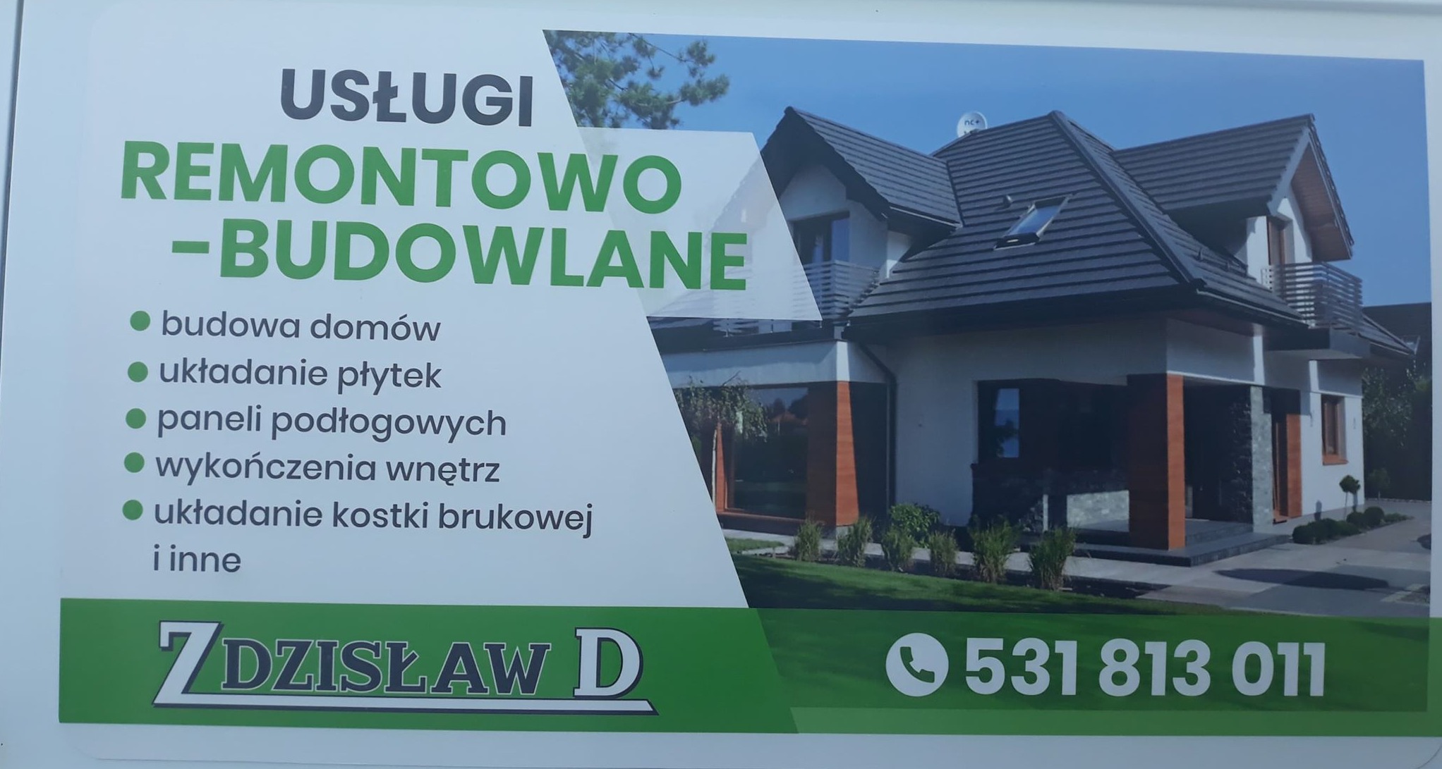 Baner reklamowy firmy remontowo-budowlanej Zdzisław D z numerem telefonu, prezentujący zdjęcie dwupiętrowego domu z ciemną dachówką i jasną elewacją.