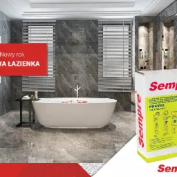 Wizualizacja nowoczesnej łazienki z marmurowymi płytkami, wolnostojącą wanną wypełnioną wodą i opakowaniem kleju żelowego do płytek marki Sempre na pierwszym planie.