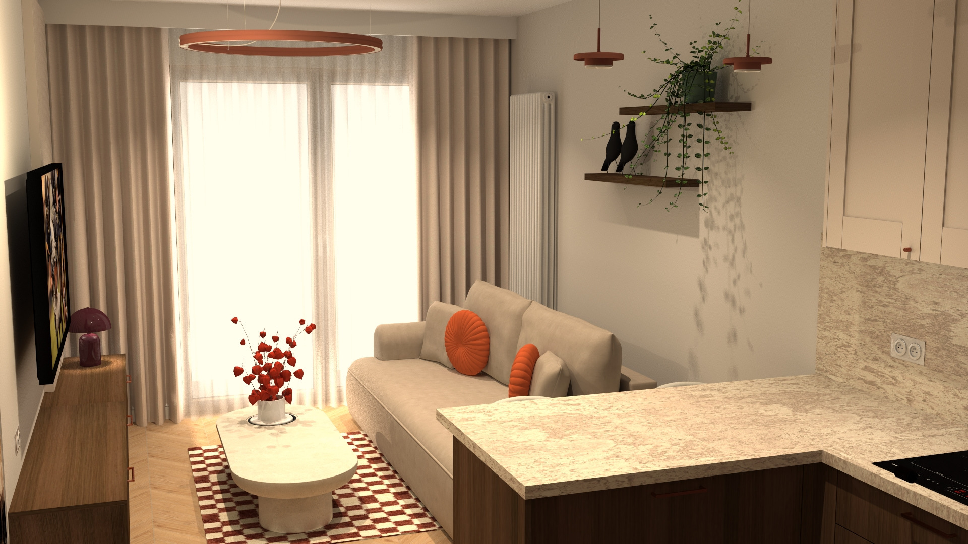 Jasne wnętrze z beżową sofą, okrągłymi poduszkami i kwiatami na stoliku. Nad sofą półki z roślinami i dekoracyjnymi ptakami. Widoczny fragment aneksu kuchennego.