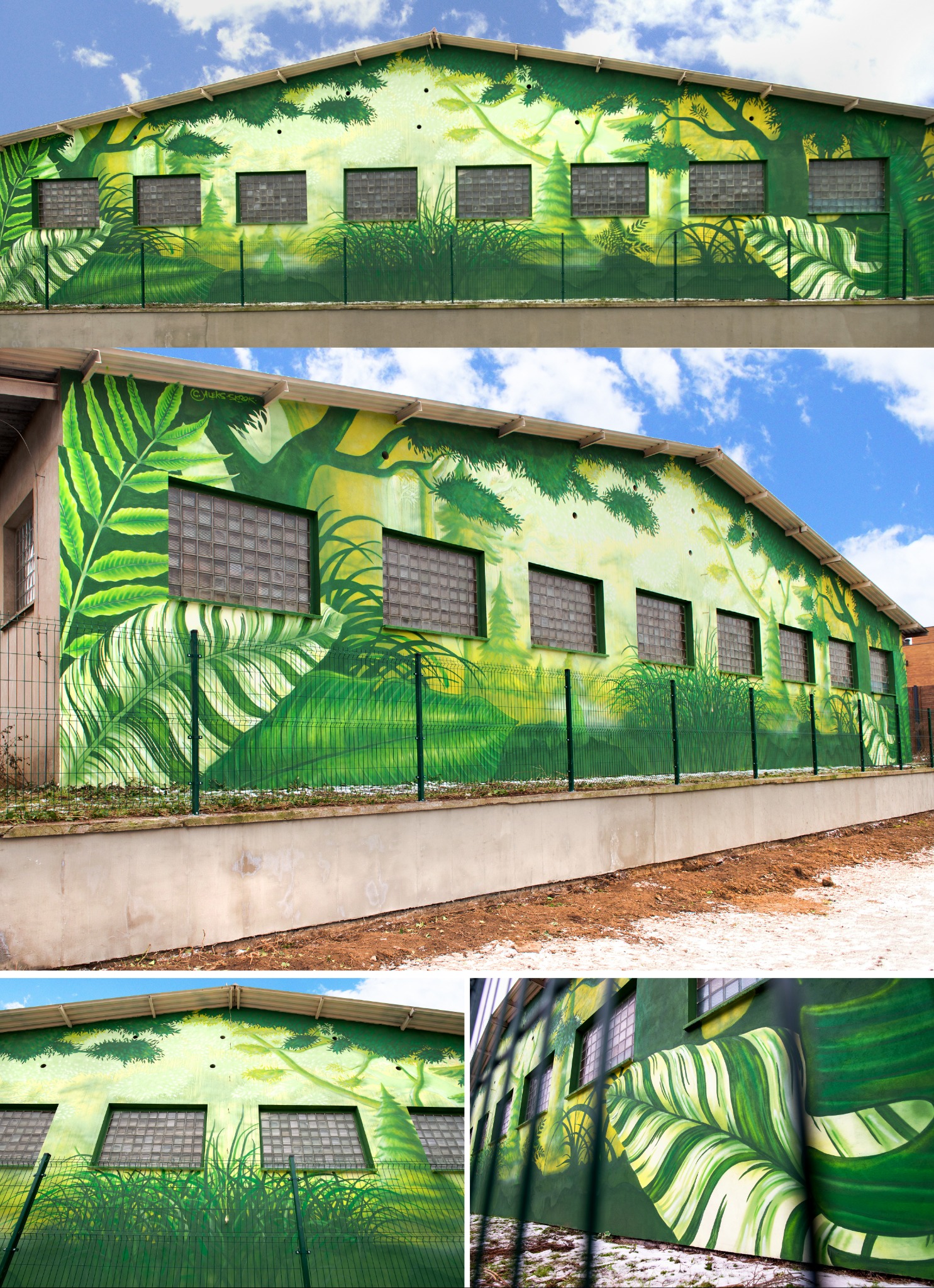 Budynek przemysłowy z muralem przedstawiającym tropikalną roślinność, zielona siatka ogrodzeniowa na betonowym fundamencie.