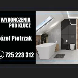 Grafika reklamowa prezentująca wykończoną łazienkę na poddaszu z wolnostojącą wanną, czarnymi panelami ściennymi i oknem dachowym, obok widnieje wizytówka z napisem 'Wykończenia pod klucz Józef...