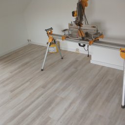 Łukasz Maryniak - Układanie paneli, montaż listew