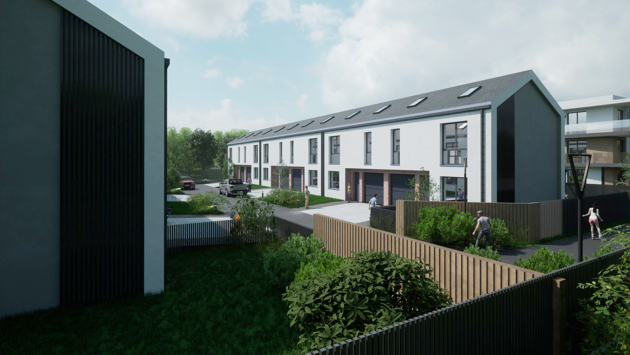 Wizualizacja szeregu nowoczesnych domów jednorodzinnych z garażami, biała elewacja z elementami grafitowymi i ceglanymi, otoczonych zielenią, z widocznymi przechodniami i samochodami na podjeździe.
