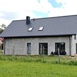 Pruszyński Płaska Plus Purmat, rynny Siba Tech, okna Roto Designo.