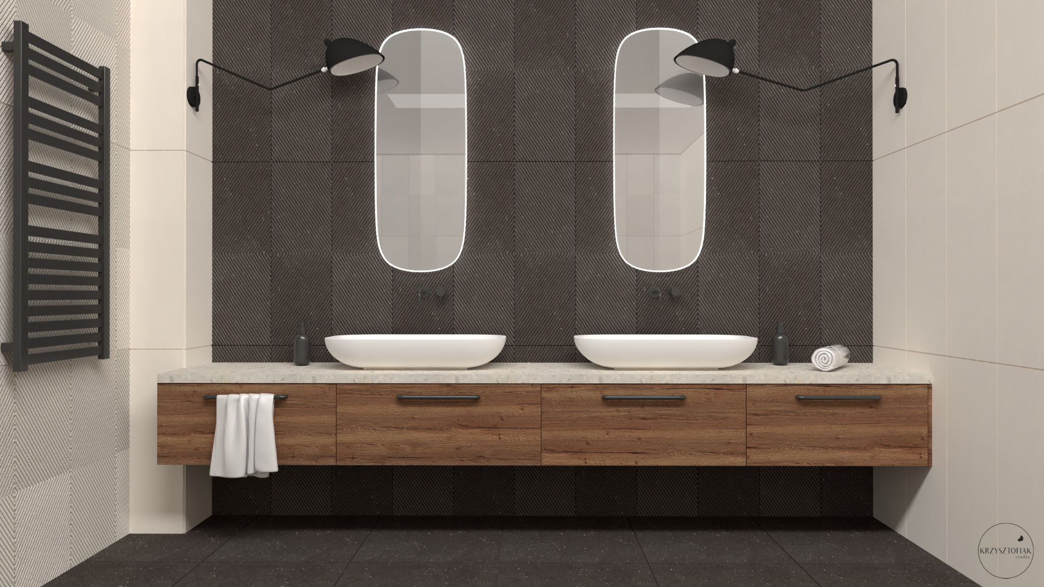 Nowoczesna łazienka z dwoma owalnymi umywalkami nablatowymi, drewnianą szafką pod umywalką, podwieszanymi lampami nad lustrami i grzejnikiem drabinkowym na ścianie z geometrycznym wzorem.