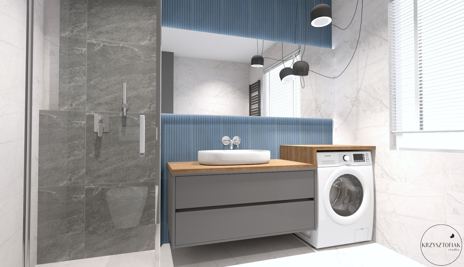 Nowoczesna łazienka z szarymi płytkami imitującymi marmur w strefie prysznica, białą umywalką nablatową na szarej szafce z drewnianym blatem, pralką Samsung i niebieskim panelem dekoracyjnym...