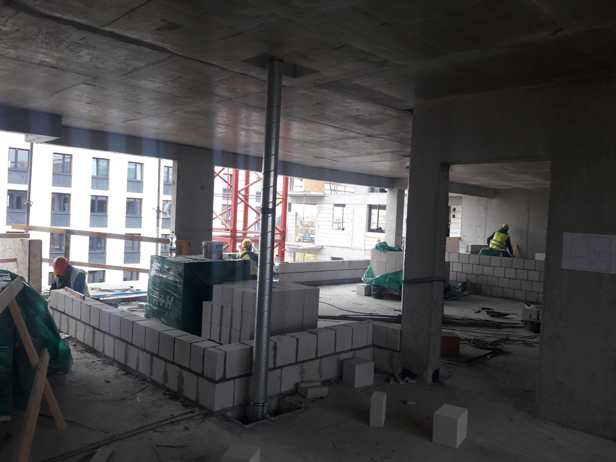 Prace murarskie ściany osłonowe i między lokalowe mury grube osiedle mieszkaniowe Warszawa ul. Budki szczęsliwickie.