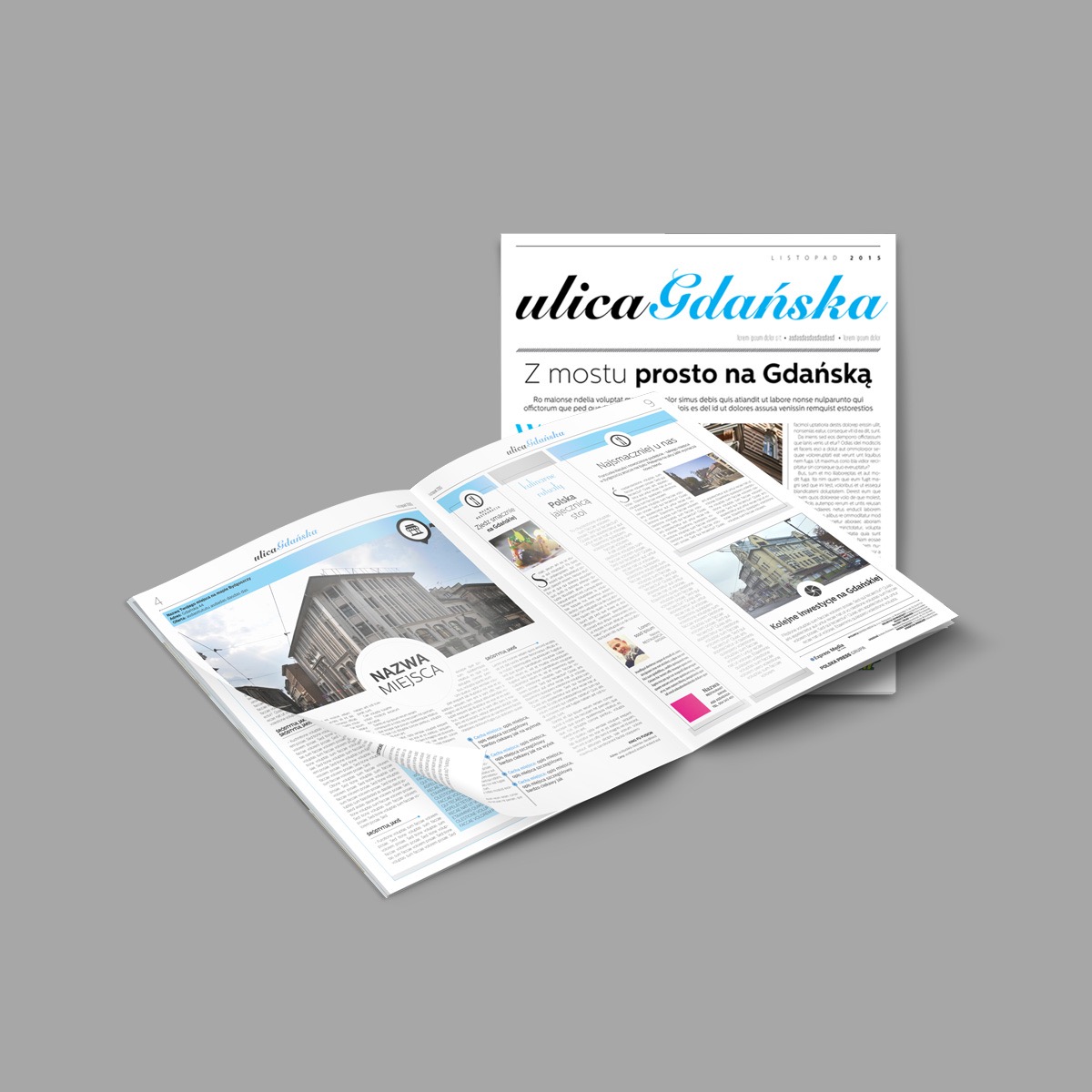 Rozłożona gazeta 'Ulica Gdańska' z artykułami, zdjęciami i nagłówkami, leżąca na szarym tle.