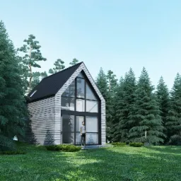 Nowoczesny dom z dużymi przeszkleniami i drewnianą elewacją, otoczony lasem iglastym, z mężczyzną stojącym na tarasie.