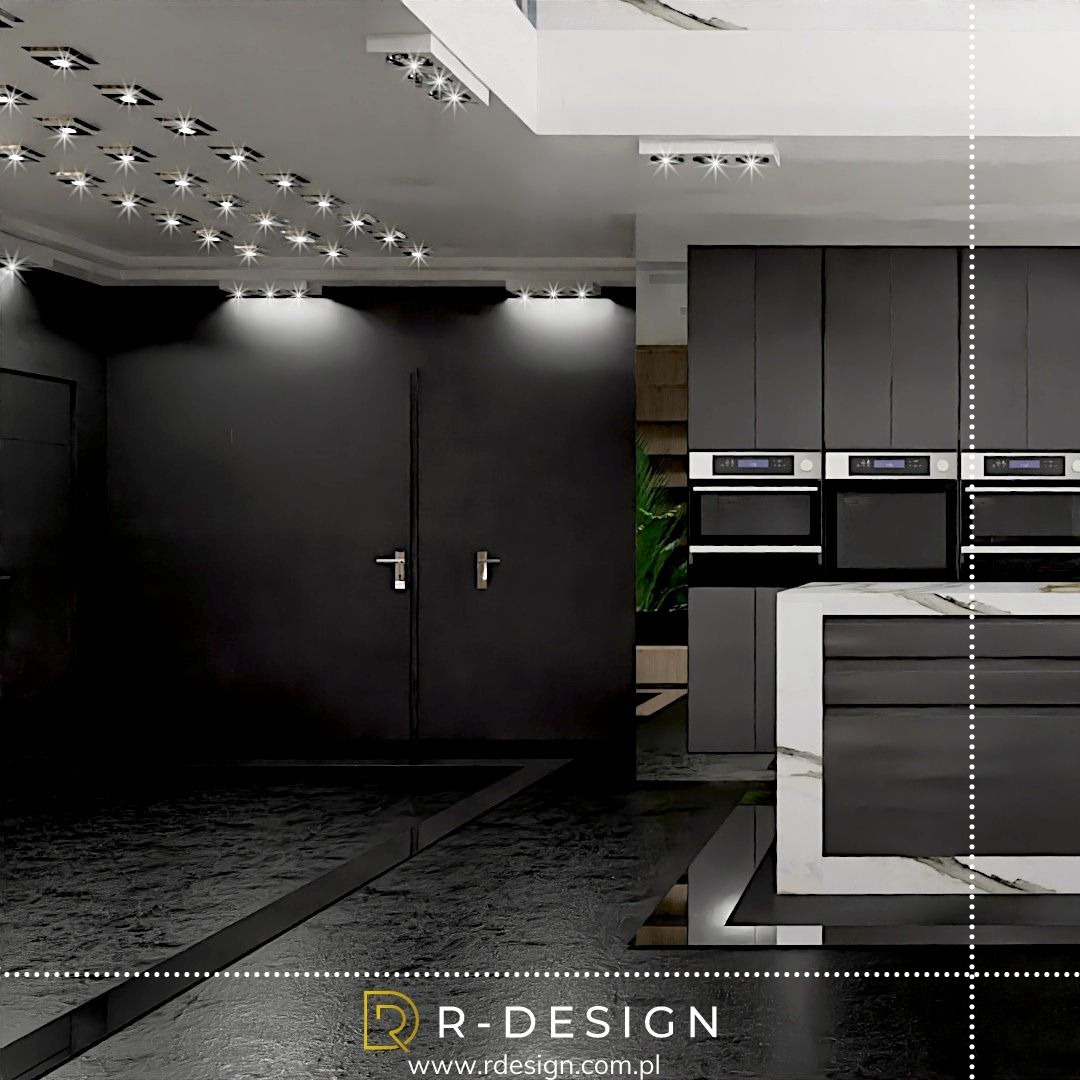 Nowoczesna kuchnia w odcieniach czerni z wyspą wykończoną białym marmurem, oświetlenie sufitowe z licznymi punktami świetlnymi, podłoga z ciemnego kamienia.