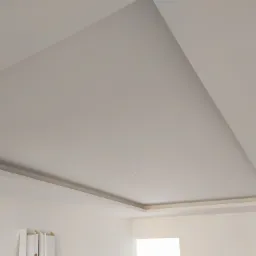 Biały sufit podwieszany z wnęką oświetleniową i elementami płyty karton gips, widoczne kable wystające z sufitu, przygotowane do montażu oświetlenia.