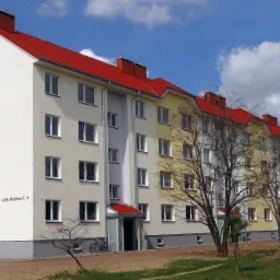 Budynek przy ul. Ks. Racibora I, składający się z 48 mieszkań i 1 lokalu usługowego. Zrealizowano jako deweloper.