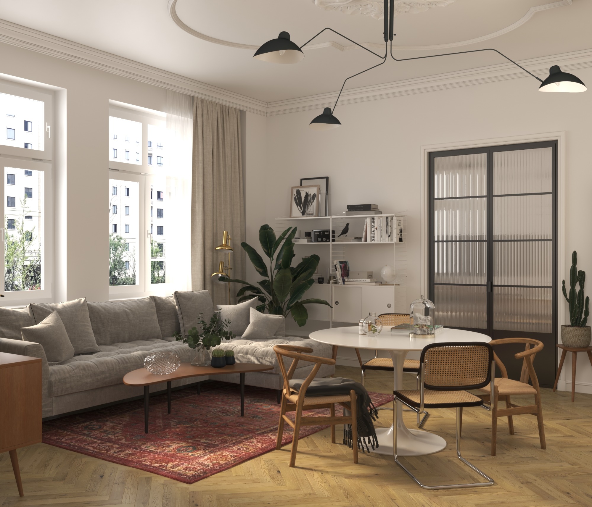 Jasne wnętrze salonu z szarą sofą, okrągłym stołem i drewnianymi krzesłami w stylu vintage, oświetlone lampą sufitową z trzema kloszami i naturalnym światłem z dużych okien.