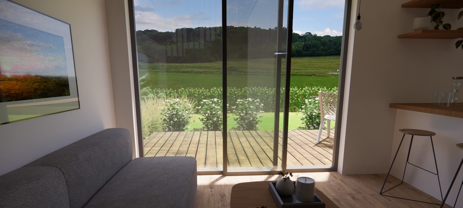 Wnętrze domu z widokiem na ogród przez przesuwne szklane drzwi, z widoczną częścią szarej sofy i minimalistycznym stolikiem kawowym z dekoracjami, oraz wysokimi stołkami barowymi przy drewnianym...